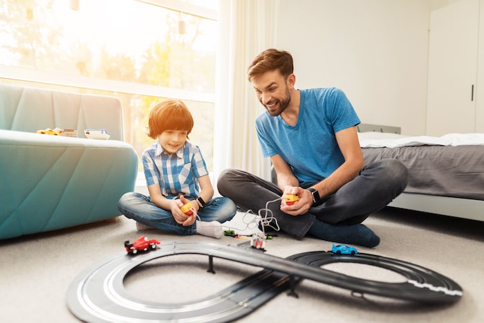 dad and son playing