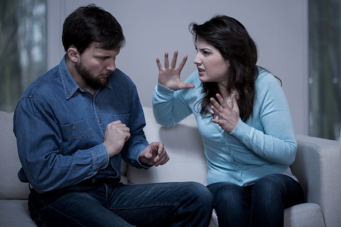 man and woman fighting