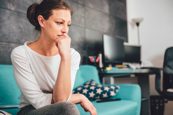 sad women sitting and thinking